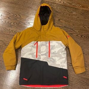 686 Kids Ski Snowboard Jacket in Mustard and Black with Camo